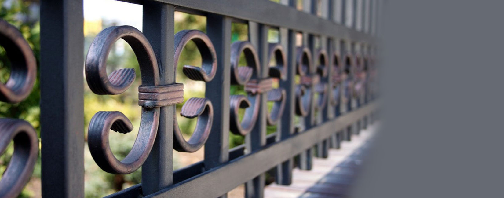 Close view of custom ornamental iron railing
